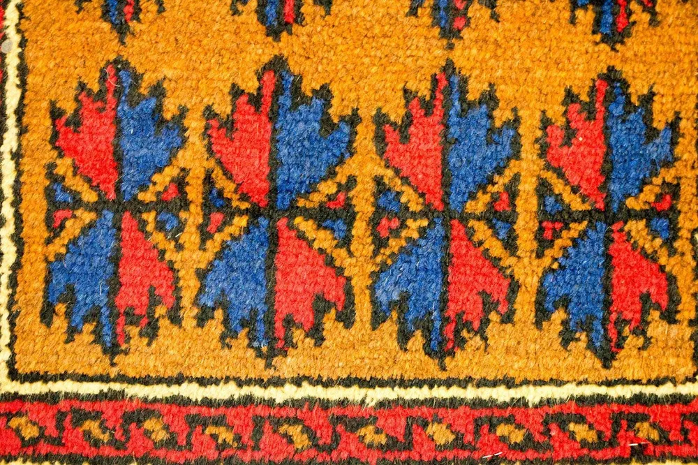 Balutsj-teppe - 135 x 75 cm - oransje